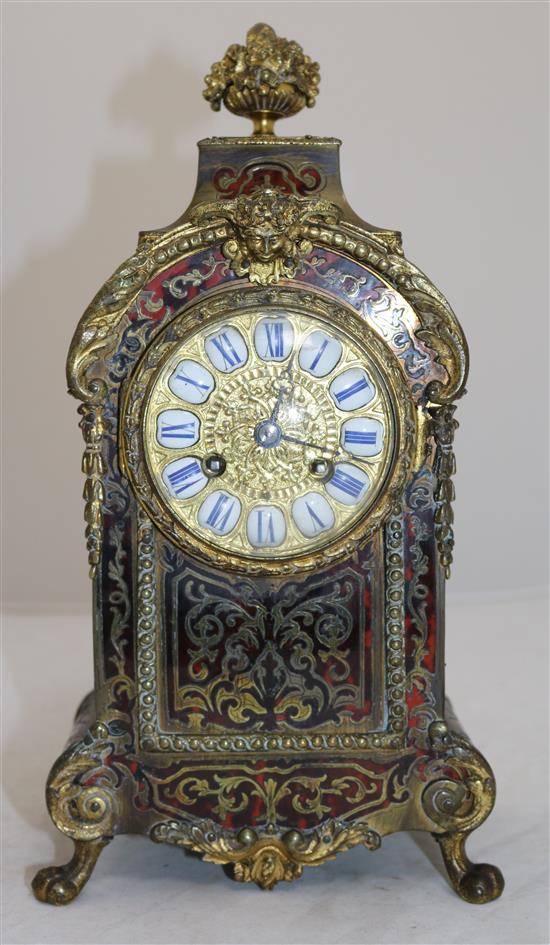 An early 20th century red boulle mantel clock, 12in.